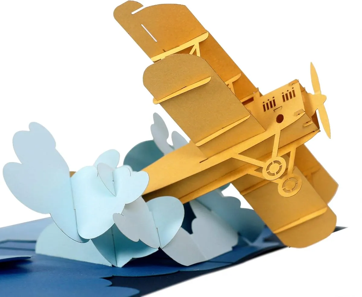 Airplane Pilot pop-up card, open, showing the cut paper layers