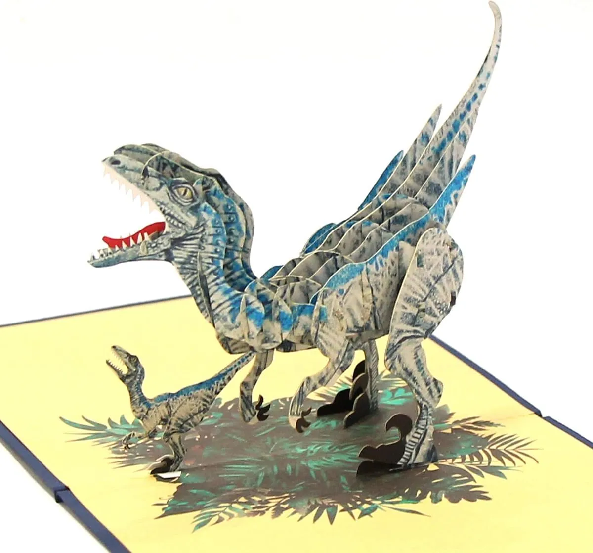 T-Rex pop-up card, open, showing the cut paper layers